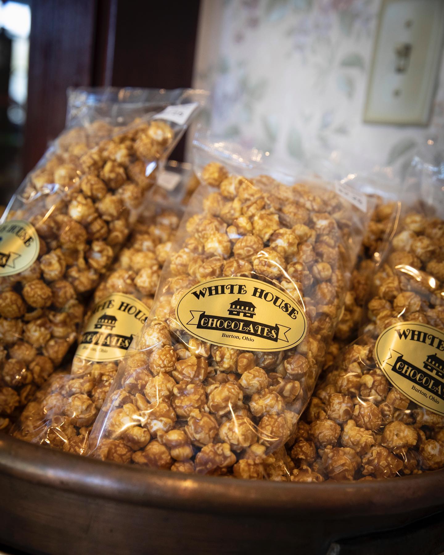 A bag of caramel popcorn.